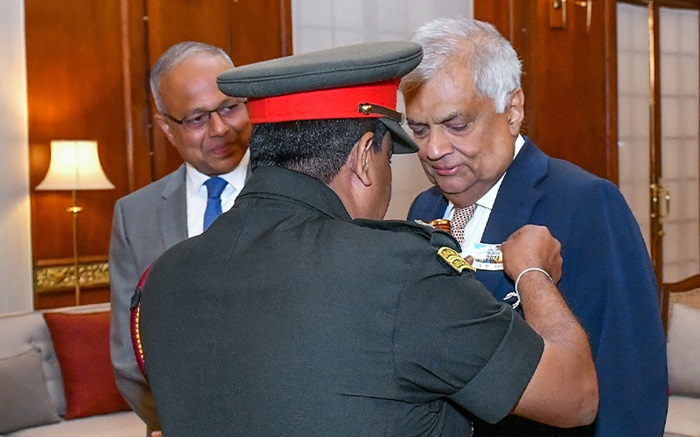 War Heroes Commemoration Flag pinned on President