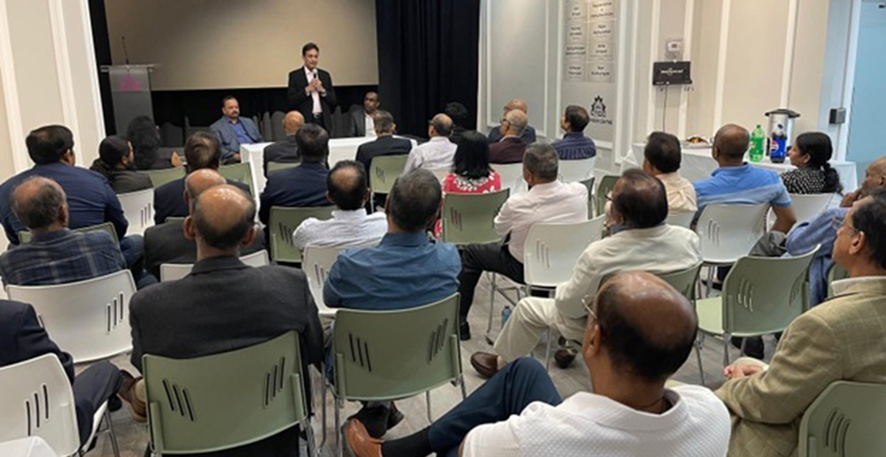 Mr. Heshana Kuruppu addressing a gathering at an event