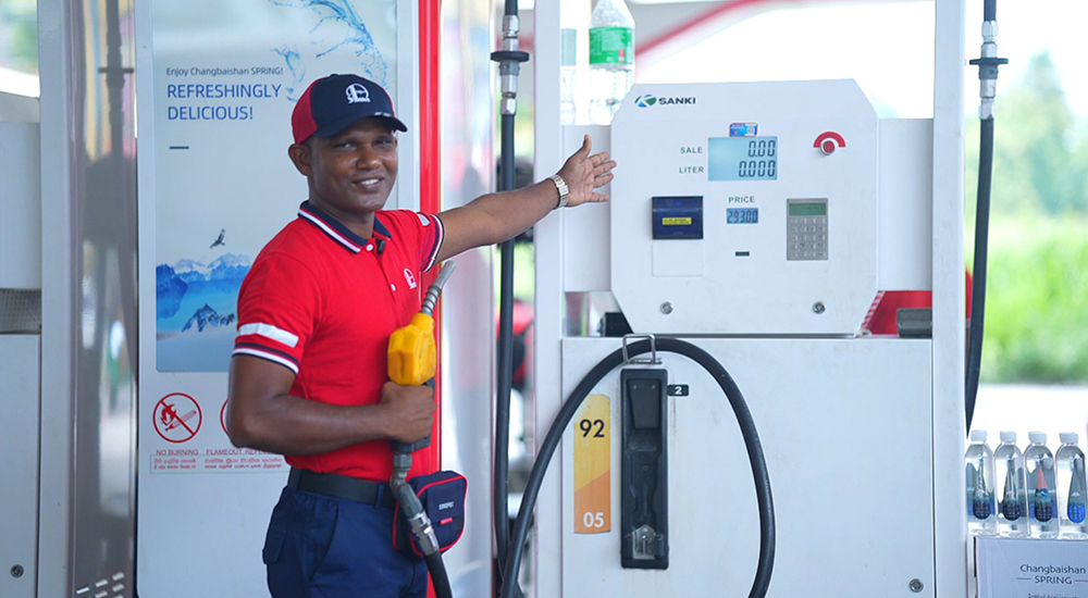 Sinopec pumpers showcasing a meter reset to zero before pumping to ensure heightened transparency