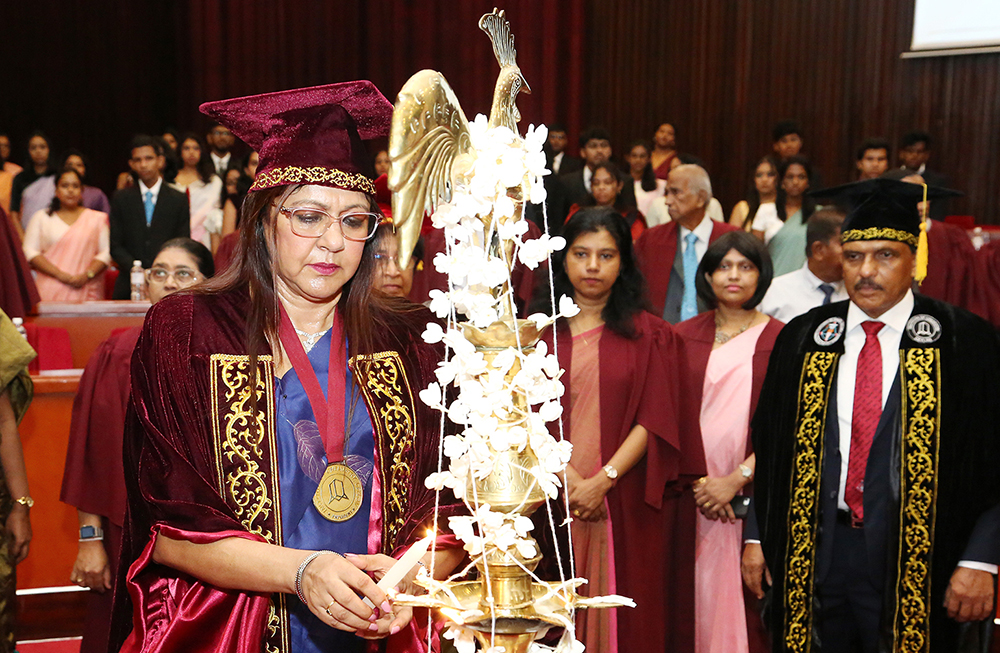 President of IChemC, Prof. Janitha Liyanage lighting the traditional oil lamp