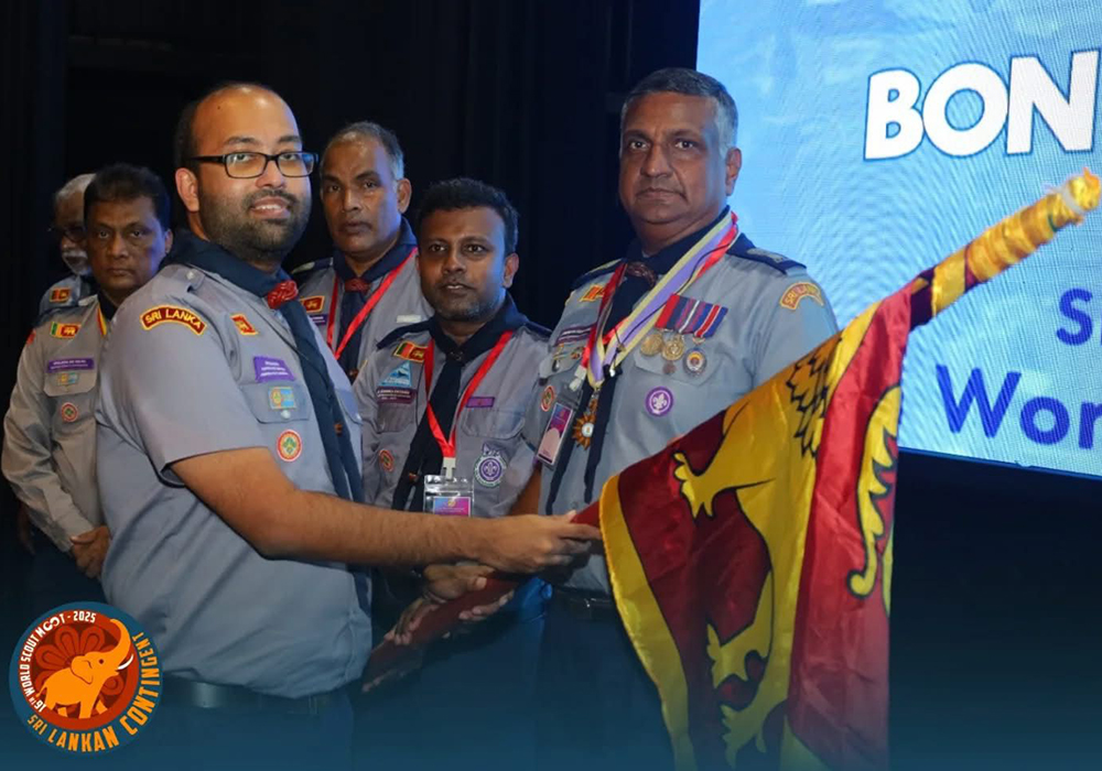 Handing over the National Flag to the Contingent by the Chief Scout Commissioner