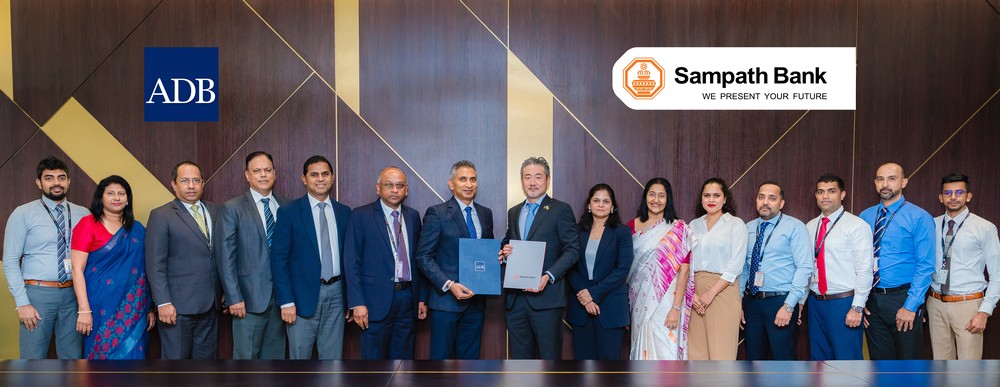 Sanjaya Gunawardana, Managing Director Designate of Sampath Bank (seventh from left), and Takafumi Kadono, Sri Lanka Country Director of the Asian Development Bank (eighth from right), at the partnership ceremony, together with senior representatives of Sampath Bank and the Asian Development Bank