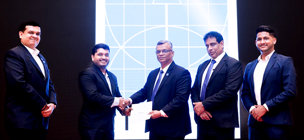 Futurity Co-Founder and Director Supun Kaluarachchi exchanging the signed partnership agreement with Eng. Kosala Kamburadeniya, President Elect of the Institution of Engineers, Sri Lanka (IESL) and Chairman of Techno 2025, marking the official appointment of Futurity as the AI Enablement Partner for Techno 2025.