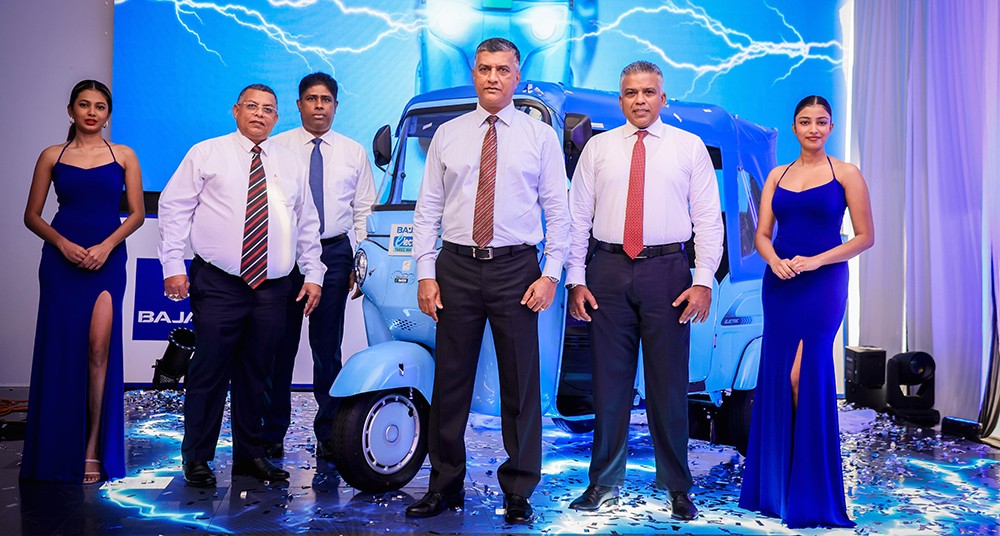 Mr. Roahana Dissanayake, Group Chairman and Managing Director, David Pieris Group of Companies, Mr. Naalaka Madugalle, Director and Chief Operating Officer, David Pieris Motor Company (Private) Limited, Mr. Jayantha Ratnayake, Chairman, David Pieris Renewable Energy (Private) Limited and Mr. Lakmal de Silva, Chief Officer – Vehicle Sales, DPMC pose with newly launched Bajaj Electric Three Wheeler at the launch