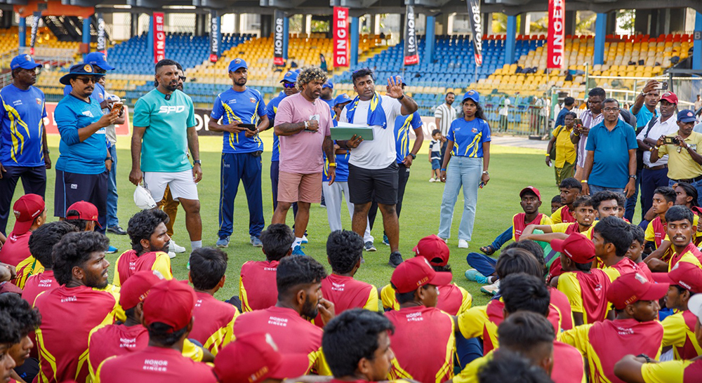 Lasith Malinga speaking to young participants