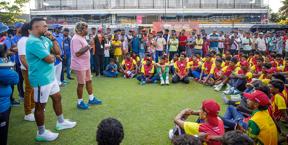 Lasith Malinga speaking to young participants