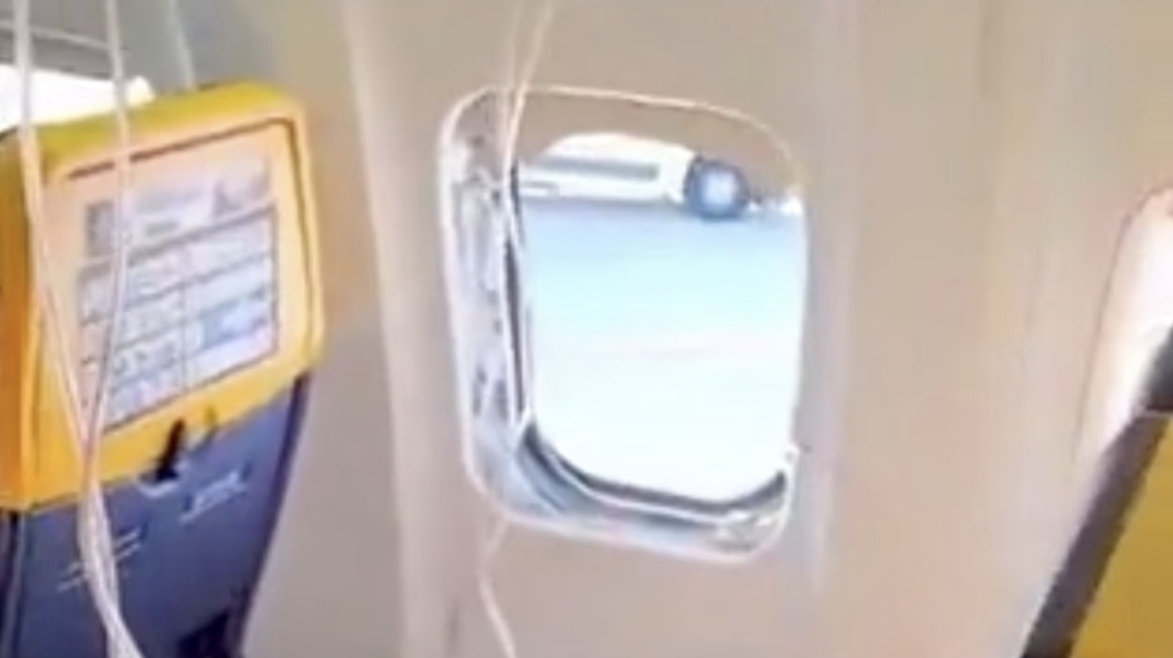 Passenger nearly sucked out after plane window dislodges mid-air