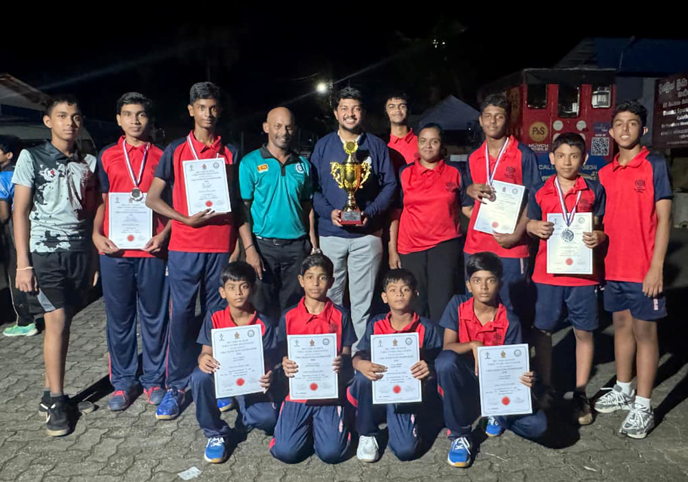 Standing from Left to Right: ThisumIllankoon, Nathesha Wijesinghe, Bilal Zaman, Mr.Rajesh Kumar (Assistant Coach), Mr.Lahiru Senarathne (MIC), Mhadhi Hassan, Ms.Kanchana Wedagedara (Coach), Shannon Kennedy, Ayesh Ellepola and Kenula Thilakarathne.Squatted from Left to Right: Hassan Zaman, Mohammed Usman, Hussein Zaman and Yoonus Zaman.
